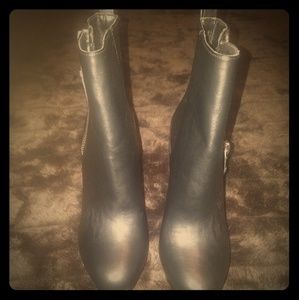 Black leather booties.   Never worn